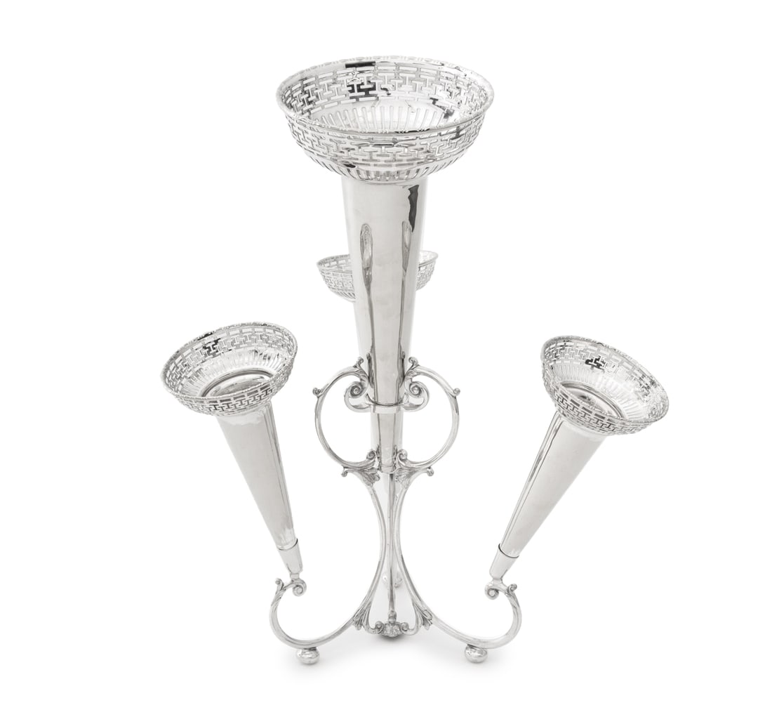 Neoclassical Motif Silver Plate 4 Trumpet Epergne: Neoclassical Motif Silver Plate Four Trumpet Epergne, the trumpets with pierced geometric Greek key rim mounted on scroll form base with three arms and bun form feet. 19" H x 12.5" Diameter. Provenanc