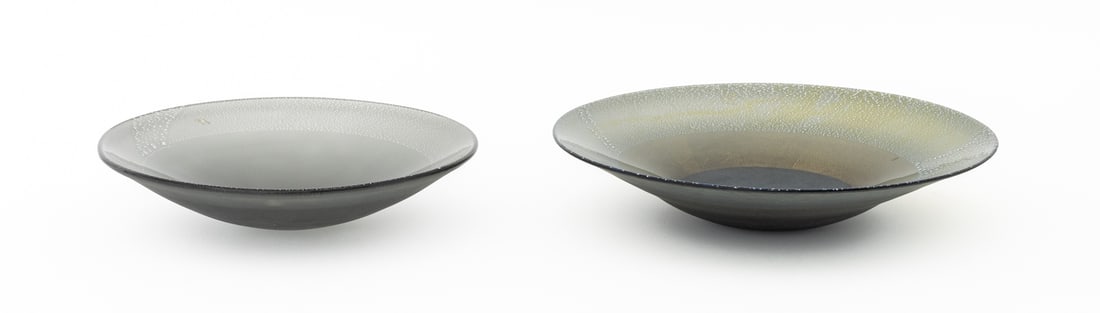 Murano Silver Leaf Smoked Glass Bowls, 2: Two Murano Silver Leaf Frosted Smoky Glass Centerpiece Bowls, the larger with inner gold-flecked glass border. Larger: 3.5" H x 16" Diameter. Provenance: From a Vintage Collection of Italian Designer