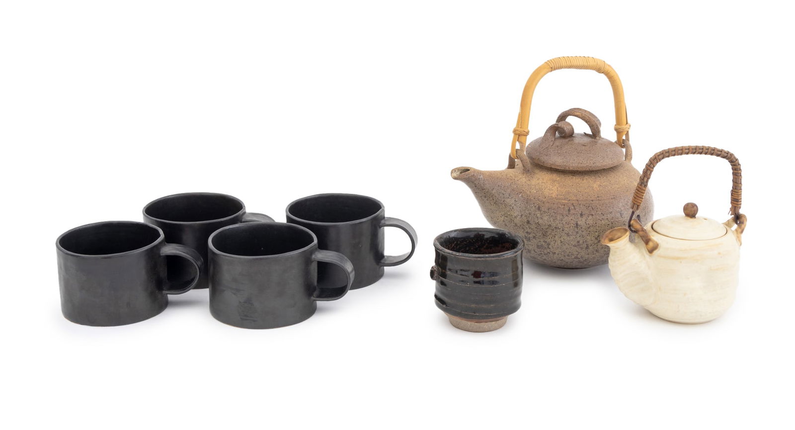 Len Carella, Etc. Pottery Tableware, 7 Pcs.: Group of Seven Studio Pottery Tableware Pieces, comprising: set of four Len Carella (American, XX-XXI) black glazed mugs, a tenmoku style glazed tea bowl, and two lidded teapots, one with bamboo