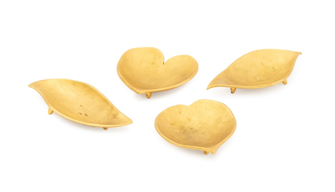 Edouard Rambaud Paris Gilt Metal Vide Poches, 4: Group of Four Edouard Rambaud Paris Gilt Metal Vide Poches, each upon three feet, marked to underside, and comprising: two heart forms and two leaf forms. Longest: 4.25" L x 1.75" W x 0.5" H. Provenan