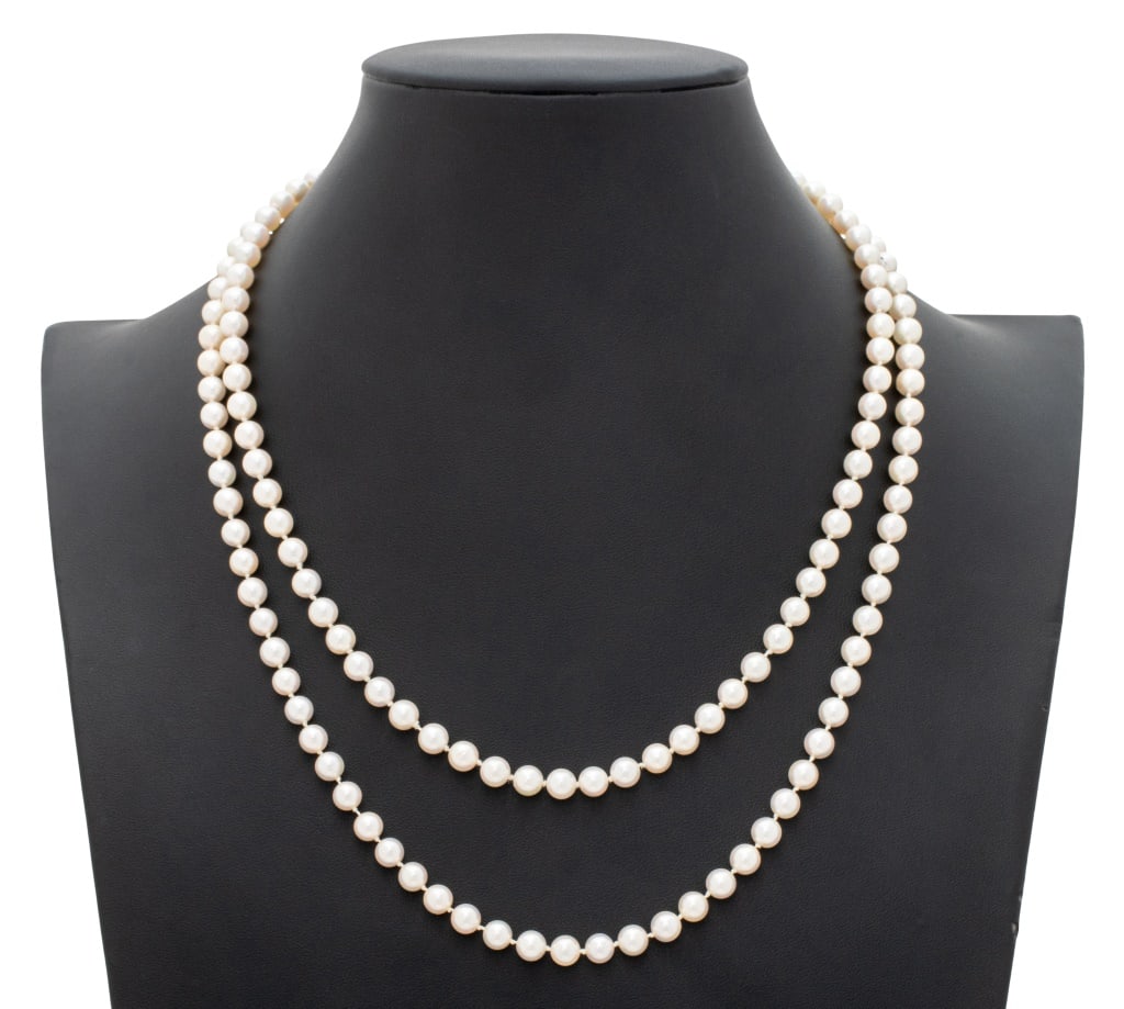 14K Yellow Gold 2-Strand Cultured Pearl Necklace: 14K Yellow Gold Two-Strand Cultured Pearl Necklace, marked: "14K". Length: 20" nested; approx.149 Cultured Pearls: 5.5 to 6.0 mm approx. Total Weight: 27.5 dwt. Provenance: From a New Jersey