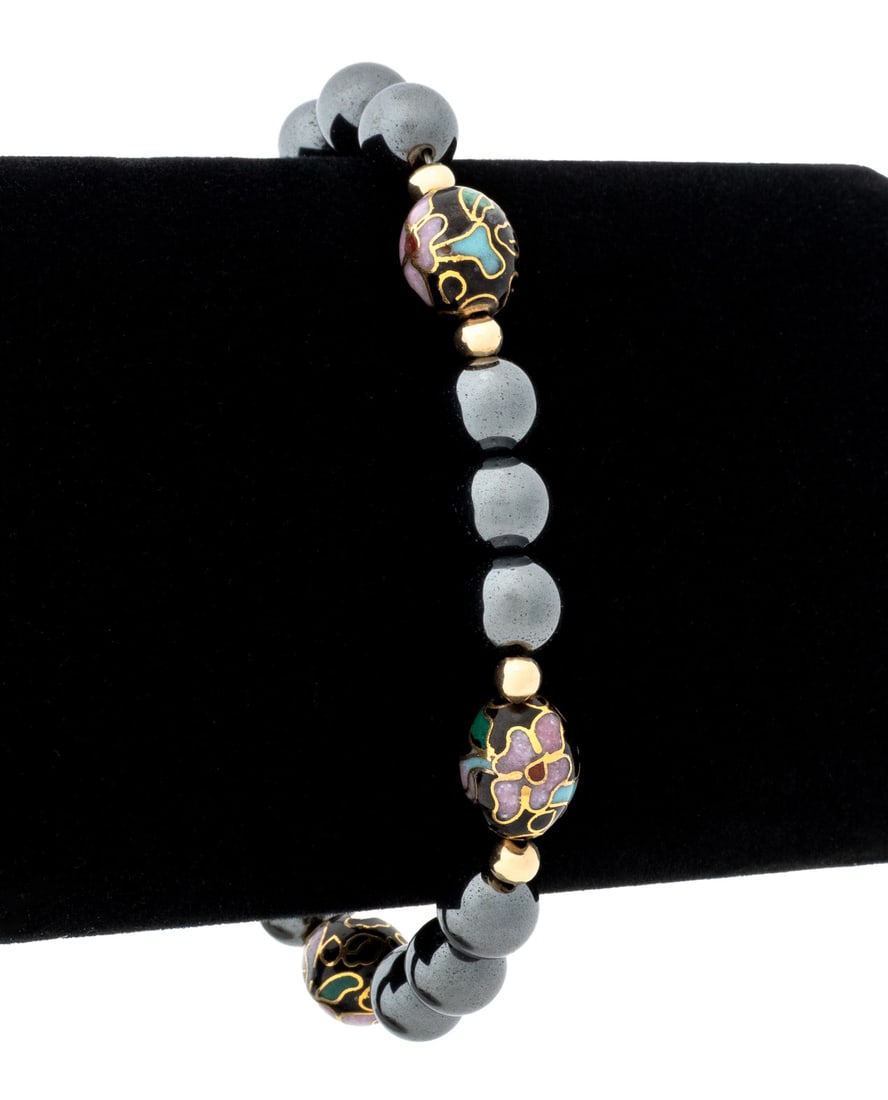 14K Hematite & Inlaid Onyx Bead Bracelet: 14K Hematite and Inlaid Onyx Bead Bracelet, featuring round fully drilled hematite, black onyx and gold rondelle beads, approx. 3.5 - 8.5 mm.,strung on cable cord, joined by spring ring clasp.
