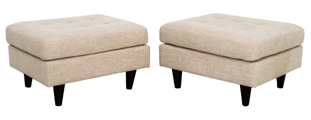 Beige Natural Linen Upholstered Ottomans, Pair: Pair of Beige Natural Linen Upholstered Ottomans, each rectangular with buttoned-tufted upholstered seat rails on rounded columnar wooden legs. 17" H x 29" W x 24" D. Provenance: From a 230 Central