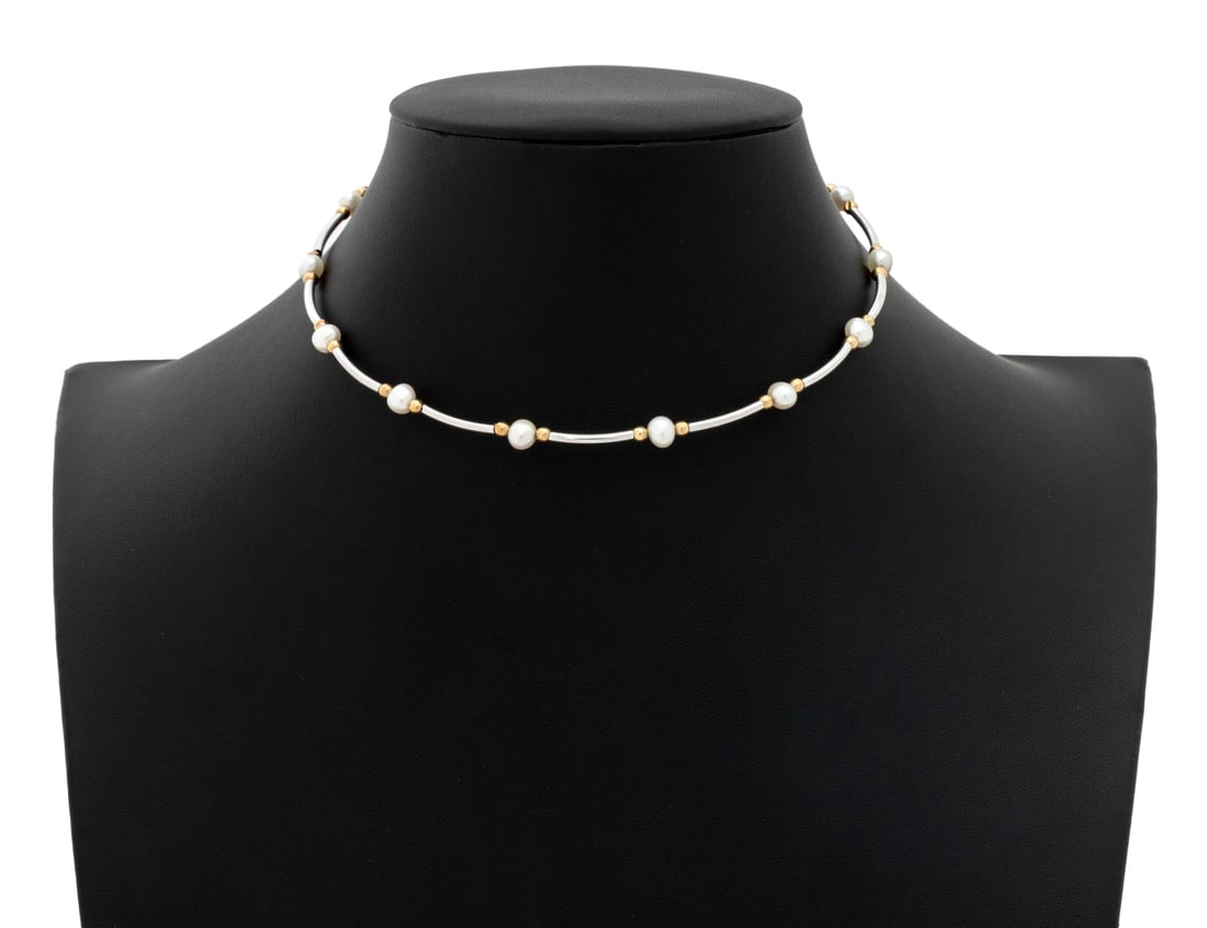 Sterling Silver 14K Gold Pearl Torque Necklace: Sterling Silver 14K Yellow Gold Cultured Pearl Torque Necklace, featuring fourteen fully drilled round cultured pearls approx. 4.5 - 6.0 mm., further adorned with silver tubes and gold rondelles, all