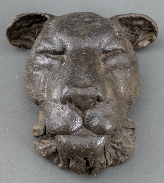 Lioness Head Cast Patinated Spelter Sculpture: Lioness Head Cast Patinated Spelter Wall-Hanging Sculpture. 10.5" H x 10" W x 5.5" D. Provenance: From an East Village Estate. Keywords: Sculpture, Metalwork, Animal, Portrait, Big Cats, Feline, Face,