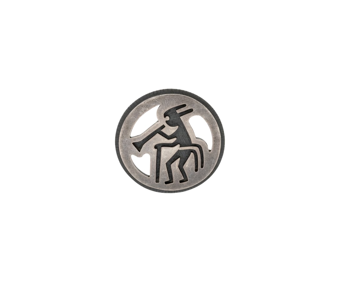 Native American Silver Kokopelli Pendant: Native American Silver Kokopelli Pendant, marked with engraving of dancing man and bear paw symbol on reverse. Pendant: 1.125" L x 1.125" W x 0.375" H. Silver tested. Approx: 0.23 ozt. Provenance: Pro