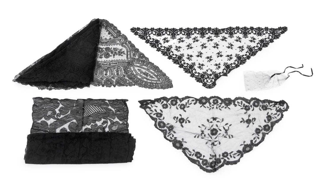 Edwardian Black Lace Fashion, 5 Pcs.: Group of Six Edwardian Black Lace Fashion Pieces, comprising: (2) two floral mourning scarf, mourning veil with black velvet tie, and (2) two shawls. Largest: 107" L x 53" W. Provenance: From the Coll