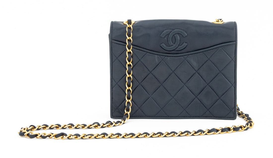 Chanel Metalasse Navy Blue Leather Handbag: Chanel Metalasse Navy Blue Leather Crossbody Bag, full front flap with gold-tone metal magnetic clasp, leather and gold-tone metal chain link strap, single zipper pocket, marked "Chanel" and "Made in