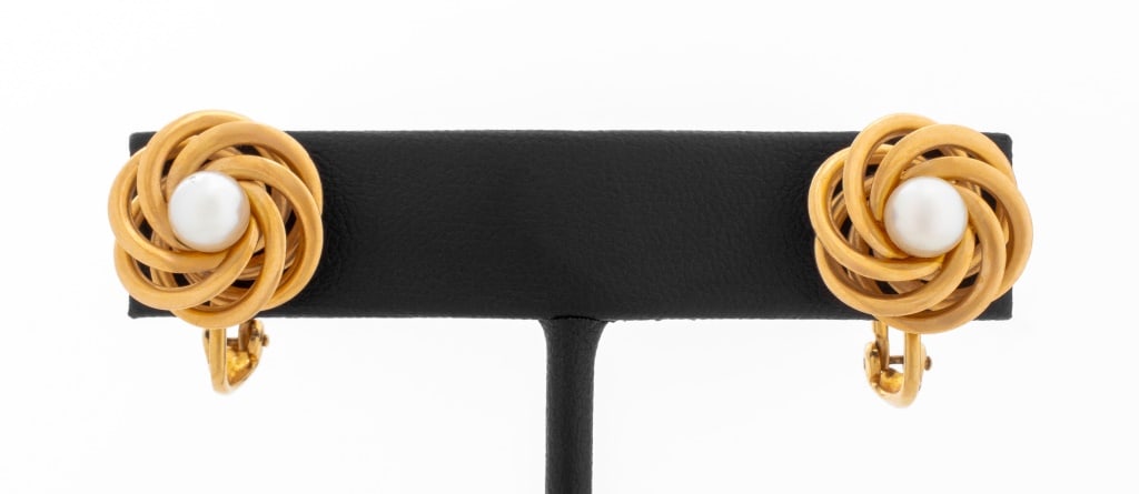 F & F Felger 14K Cultured Pearl Earrings: Pair of F and F Felger 14K Yellow Gold Cultured Pearl Earrings, featuring two round cultured pearls 5.5 - 6.0 mm., worn on earlobes with clip-on omega backs and pads, marked: "14K FFF". Measuring