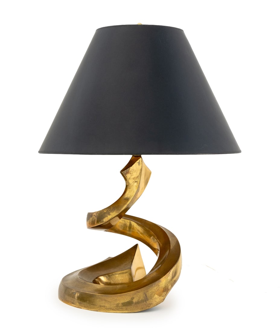 Modern Brass Spiral Form Table Lamp: Modern Brass Spiral Form Table Lamp, with black shade. Overall: 20.5" H x 15.5" Diameter. Provenance: From a New York City Collection. Keywords: Lighting, Accent lamp, Metalwork, MCM, Mid-Century Mode