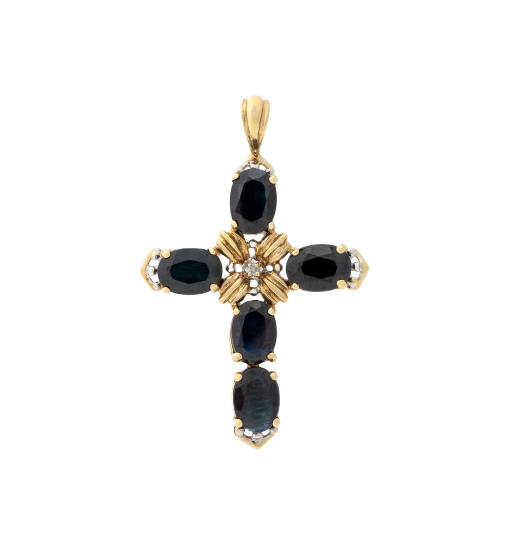 10K Yellow Gold Sapphire and Diamond Cross Pendant: 10K Yellow Gold Sapphire Diamond Cross Pendant, featuring five prong set oval brilliant cut blue sapphires weighing a total of approx. 4.40 carats, further adorned with one prong set round faceted
