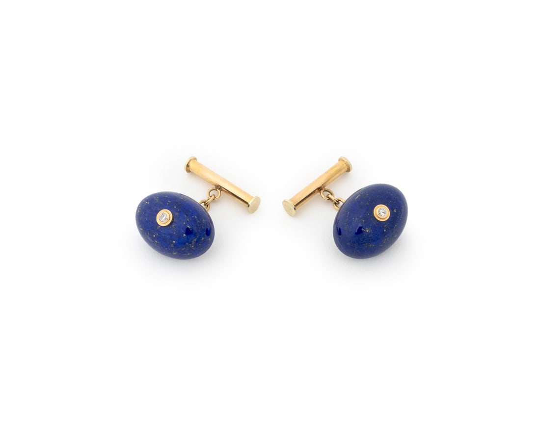 14K Yellow Gold Lapis and Diamond Cufflinks: Pair of 14K Yellow Gold Lapis Lazuli and Diamond Cufflinks, featuring two lapis cabochons weighing a total of approx. 24.00 carats, further adorned with two bezel set round brilliant cut diamonds