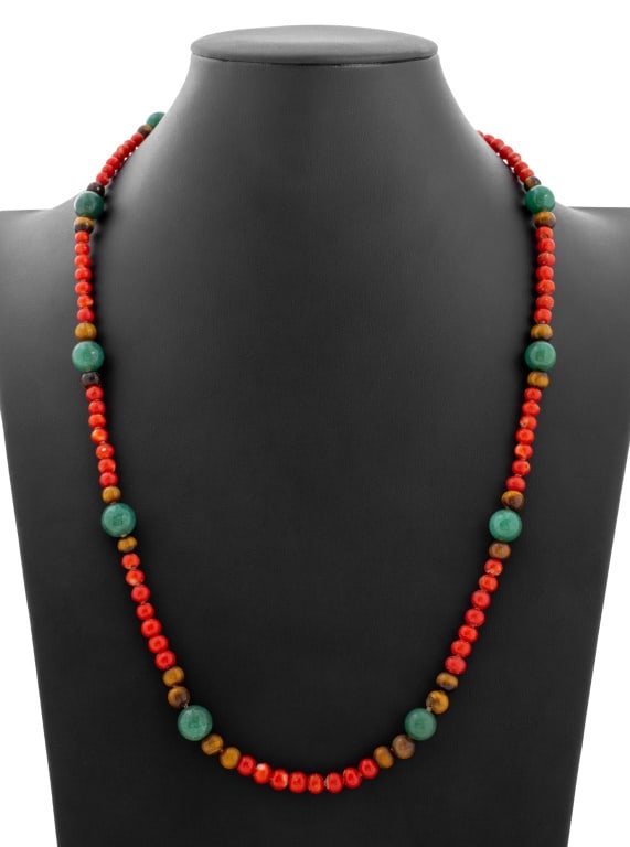 14K Yellow Gold Multi-Gemstone Opera Necklace: 14K Yellow Gold Coral, Tiger's Eye, and Aventurine Quartz Opera Length Necklace, ending in flower motif sapphire, ruby, and emerald box and tongue clasp with figure 8 safety. 76 coral beads, 24 tiger