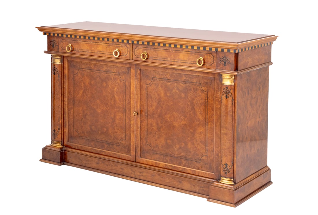Empire Style Burr Walnut Buffet: Empire Style Burr Walnut Buffet, the rectangular top on two frieze drawers with four brass ring handles above two door cabinet with four interior shelves flanked by gilt trim columns and ebonized flor