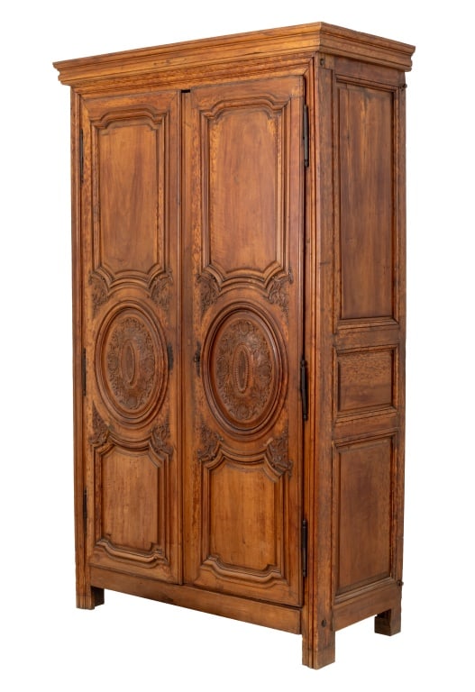 Louis XVI Provincial Ornamental Armoire, 18th C.: Louis XVI Provincial Ornamental Armoire, 18th century, walnut with ornamental carved oblong roundels and pedimented cornice, the inside subdivided with two shelves on each side. 92" H x 50" W x 24" D.