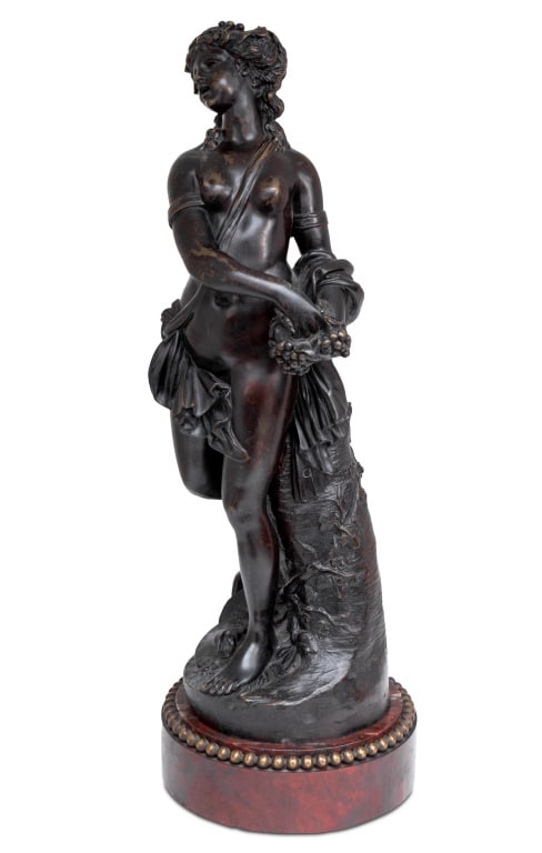 Clodion "Bacchante" Patinated Bronze Sculpture: Clodion (Claude Michel, French, 1738-1814) "Bacchante" Patinated Bronze Sculpture, 19th century, on a rouge griotte marble circular plinth, unsigned. 16.5" H x 6.5" Diameter. Keywords: French Art, Bro