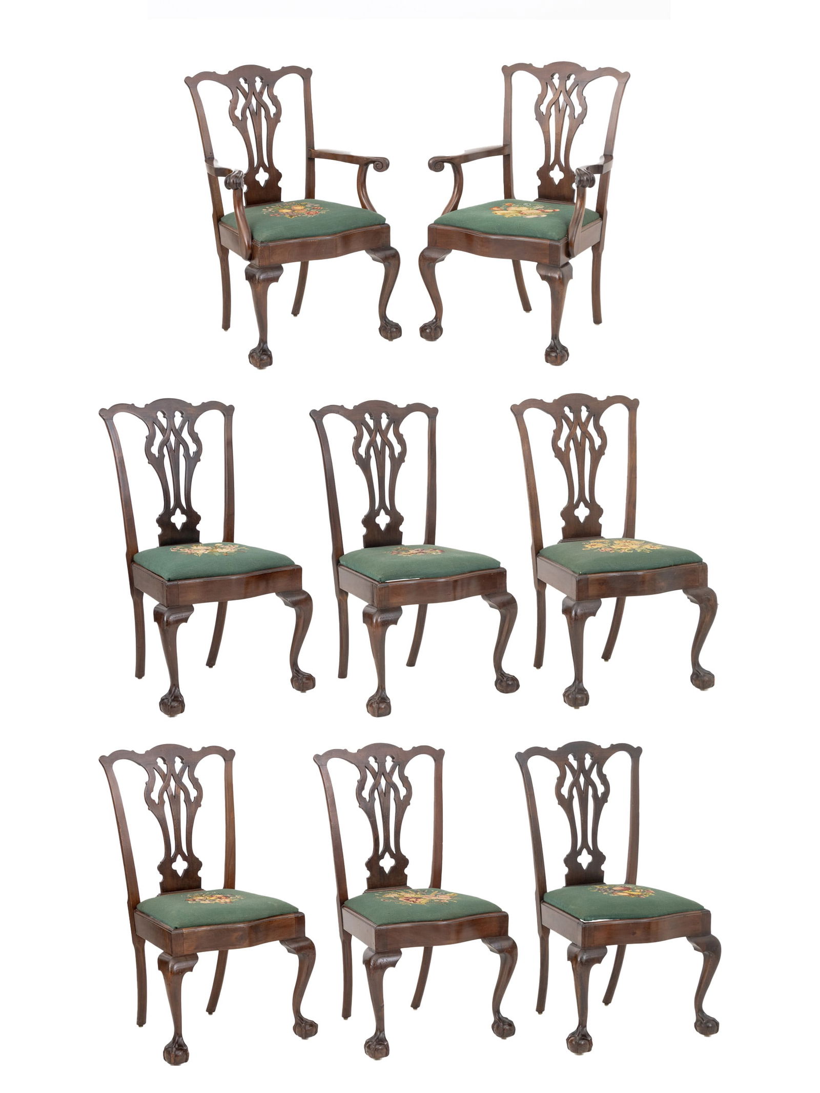 George III Style Mahogany Dining Chairs, 8: Set of Eight George III Style Mahogany Dining Chairs, two armchairs and six side chairs, each with carved pierced back splat and green needlepoint upholstered seat above claw and ball feet. Armchair: