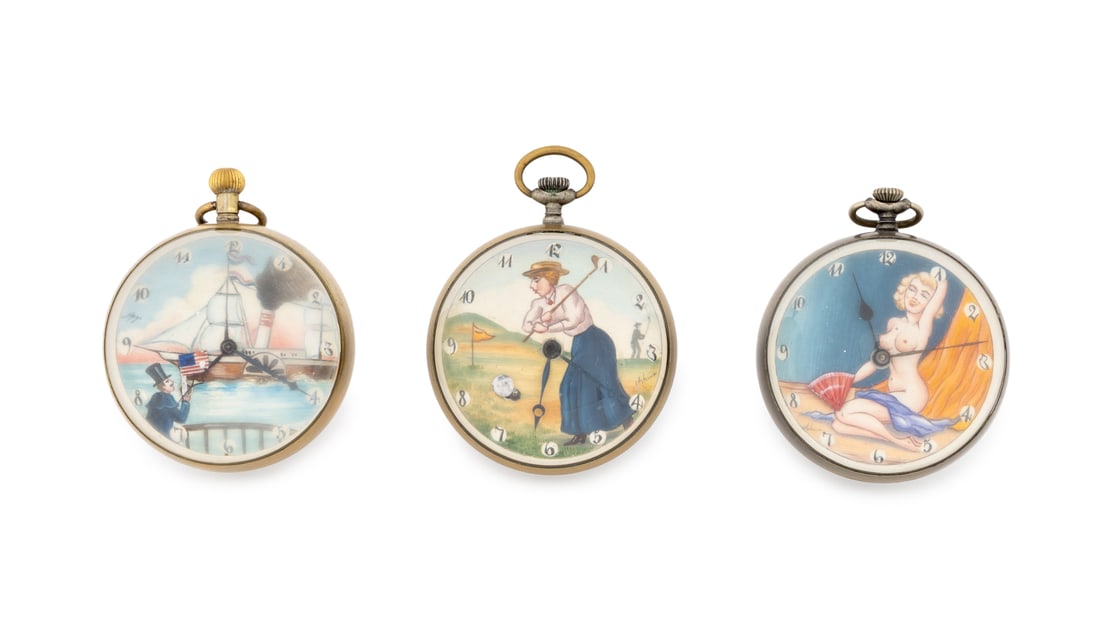 Figural Scene Hand-Painted Dial Ball Clocks, 3: Group of Three Figural Scene Hand-Painted Dial Ball Clocks, two marked "Doxa / Locle" and comprising: one with pin-up girl interior scene, signed lower left, one with woman playing golf, signed lower