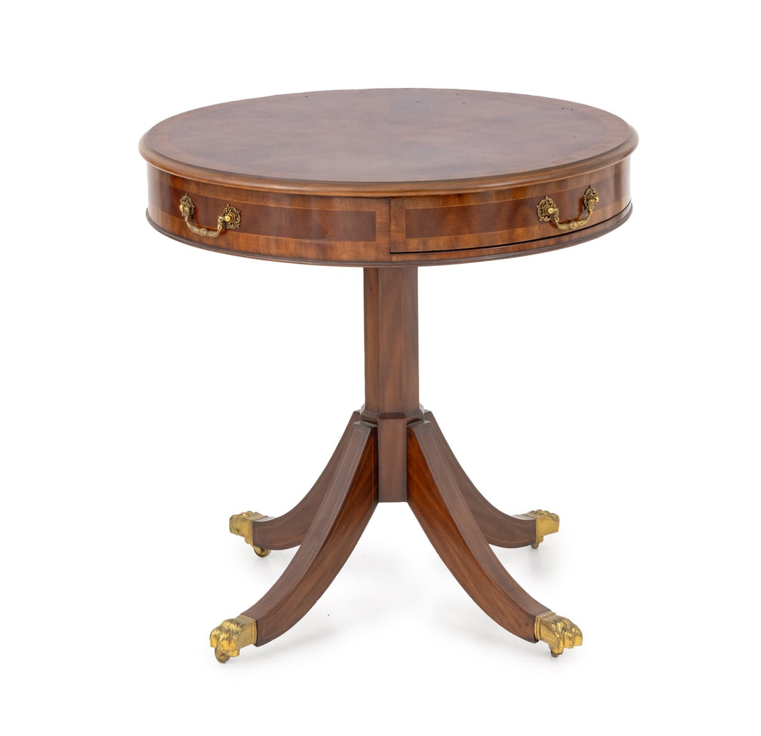 Maitland Smith Mahogany Occasional Table: Maitland Smith Mahogany Occasional Table, with single frieze drawer and three faux drawers on pedestal base with four brass mounted paw feet, "Maitland Smith" plaque to interior drawer. 28.5" H x 27.5