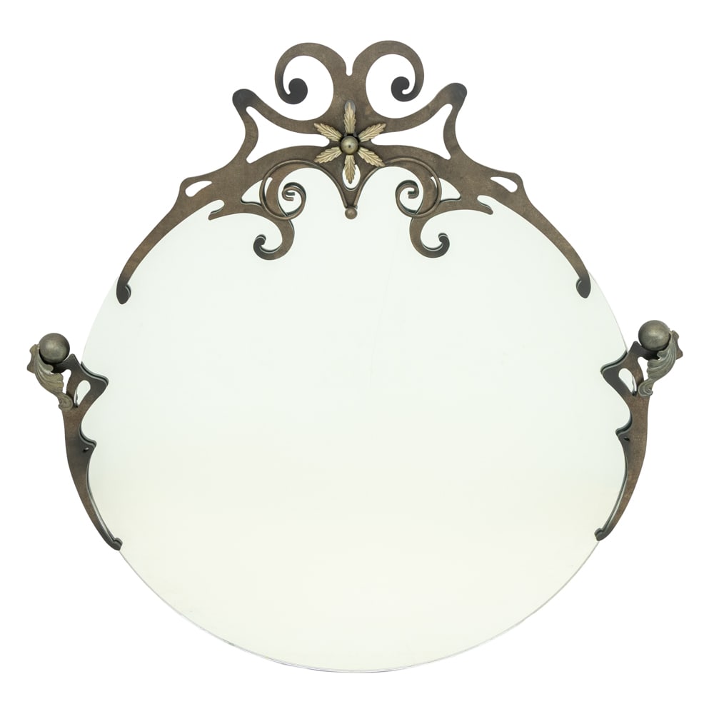 Art Nouveau Style Wrought Iron Circular Mirror: Art Nouveau Style Wrought Iron Circular Mirror, the pierced scroll form crest with ball form and floral appliques. 42" H x 41" W x 2" D. Provenance: From a New York City Collection. Keywords: Looking