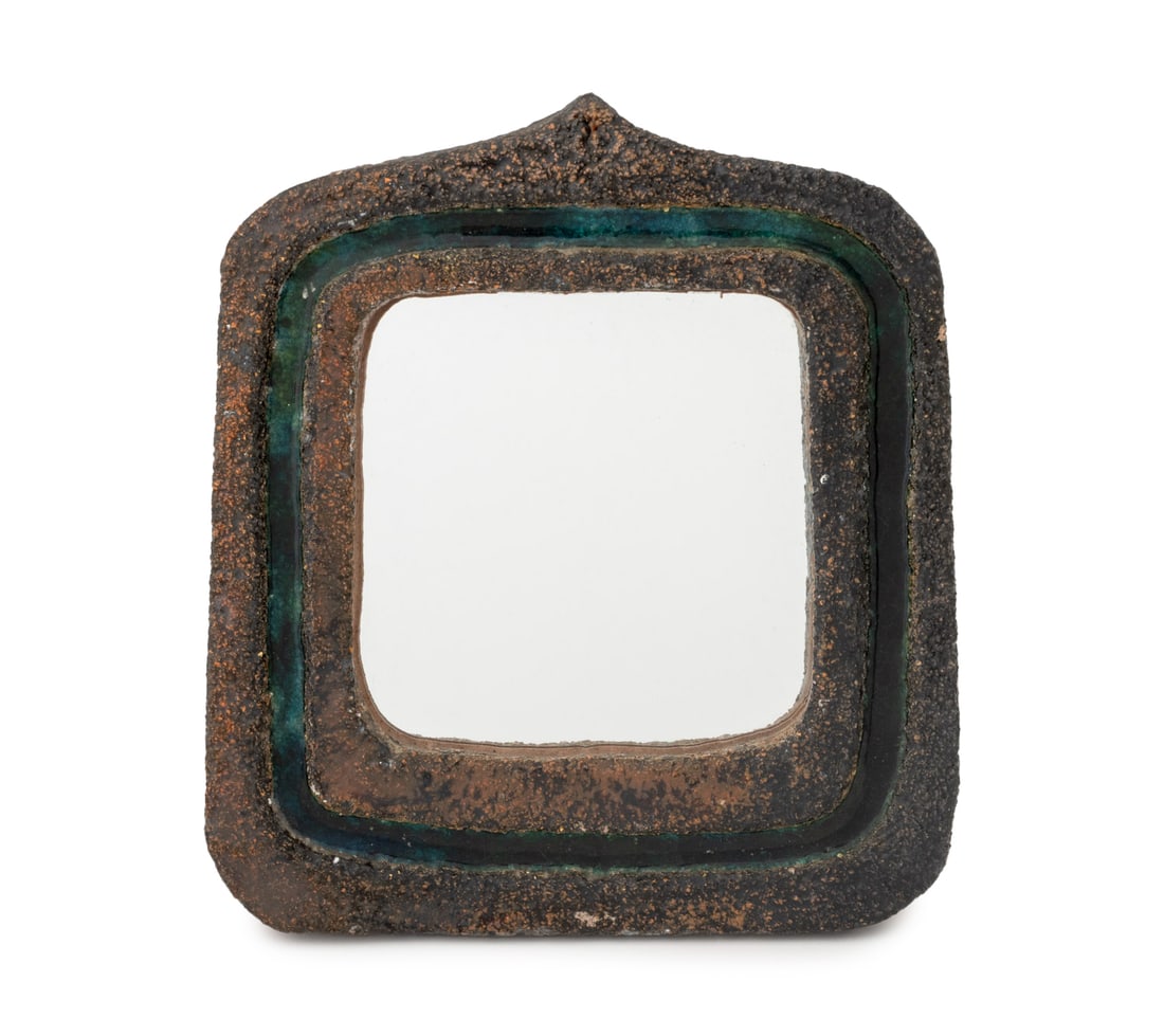 Modern Art Pottery Framed Wall Mirror: Modern Art Pottery Framed Wall Mirror, glazed stoneware with blue trim with black ground. Mirror plate: 10.25" H x 10" W; frame: 18.75" H x 16.5" W x 1.25" D. Provenance: From a New York City