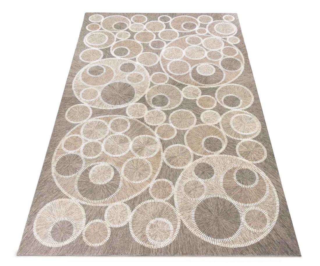 Martin Patrick Evan Ltd. Gray Carpet, 13' x 8': Martin Patrick Evan Ltd. Wool and Silk Gray Minimalist Carpet, with circle design, label to underside. 13' 2" L x 8' 3" W. Provenance: From a 28 East 70th Street Penthouse Estate. Keywords: Carpets,