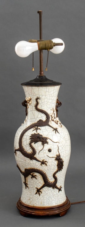 Chinese Ge-Yao Type Dragon Vase Mounted Lamp: Chinese Ge-Yao Type Dragon Vase Mounted as a Table Lamp, wooden base with two light bulb fittings. 30.5" H x 8" Diameter. Provenance: From an Upper West Side estate located at the Ansonia. Keywords:
