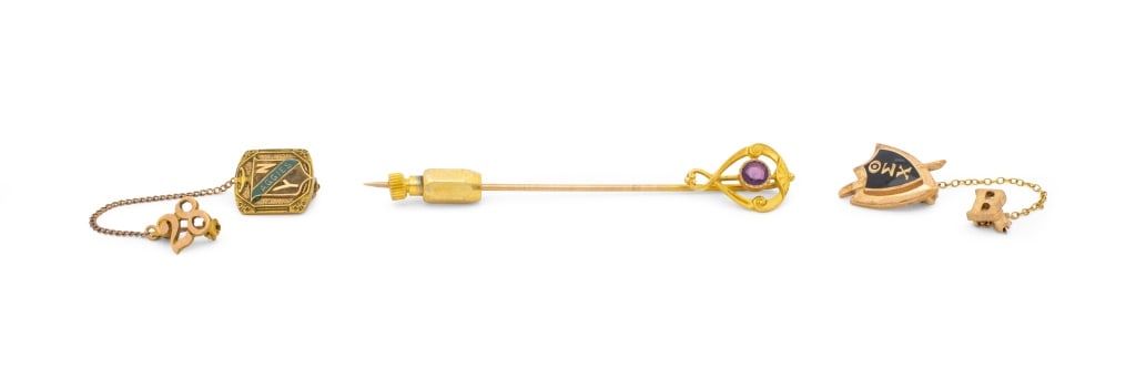 10K Yellow Gold Pins, 3: 10K Yellow Gold Pin Set, featuring three pins, first pin designed as stick pin with bezel set round faceted amethyst weighing approx. 0.10 carat, second pin designed as fraternity pin featuring black