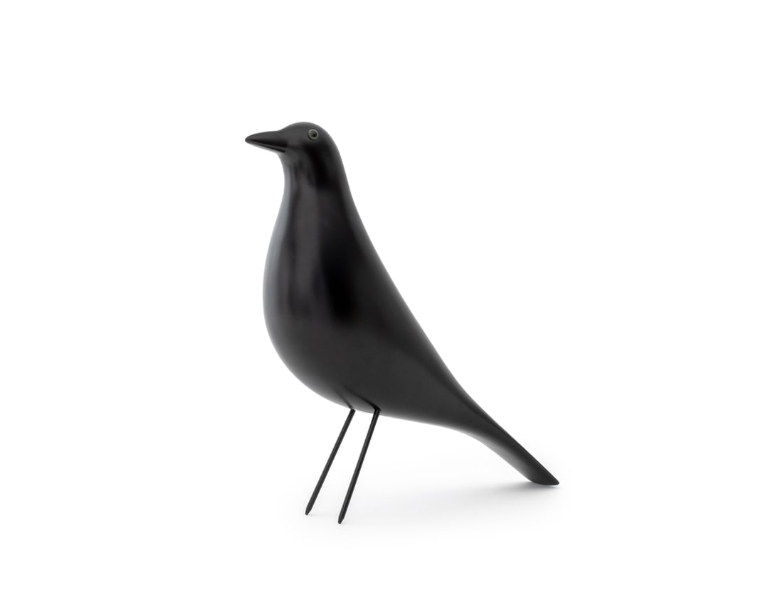 Charles & Ray Eames House Bird Sculpture: Charles and Ray Eames House Bird Sculpture, black lacquered wood body with steel wire legs, with "Vitra Design Museum / Eames House Bird / (c) Eames Office" label to underside. 11.25" H x 11" W x
