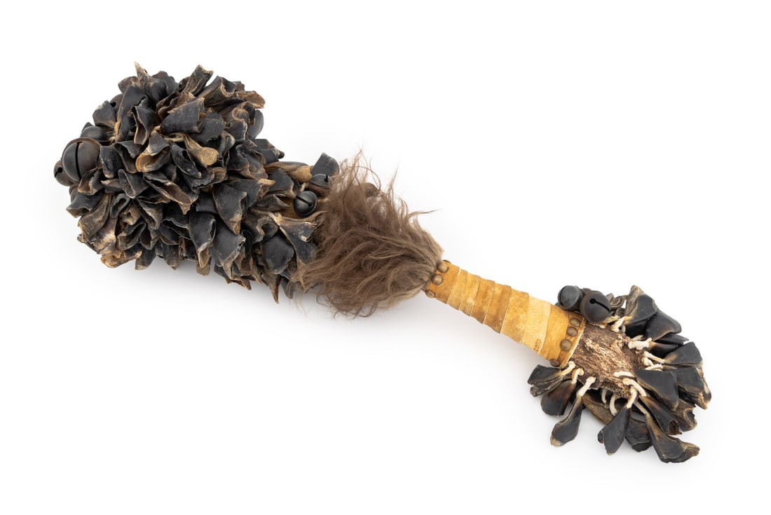 Black Eagle "Thundercrack II" War Medicine Rattle: Black Eagle (American, XX-XXI) "Thundercrack II" War Medicine Rattle, 2010, bison hump vertebrae and hair, deer hooves and tanned skin, hawk bells, signed and dated to handle. 26" H x 9" Diameter. Pro