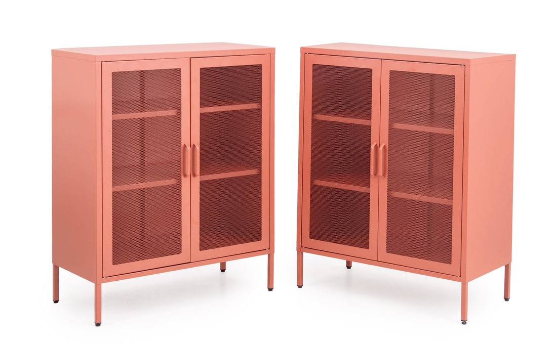 Novogratz Channing Two-Door Cabinets, Pair: Pair of Novogratz Channing Two-Door Cabinets, each in pink terracotta finish with two screen paneled metal doors opening to three shelves. 40" H x 31.5" W x 16" D. Provenance: From an East Village Est