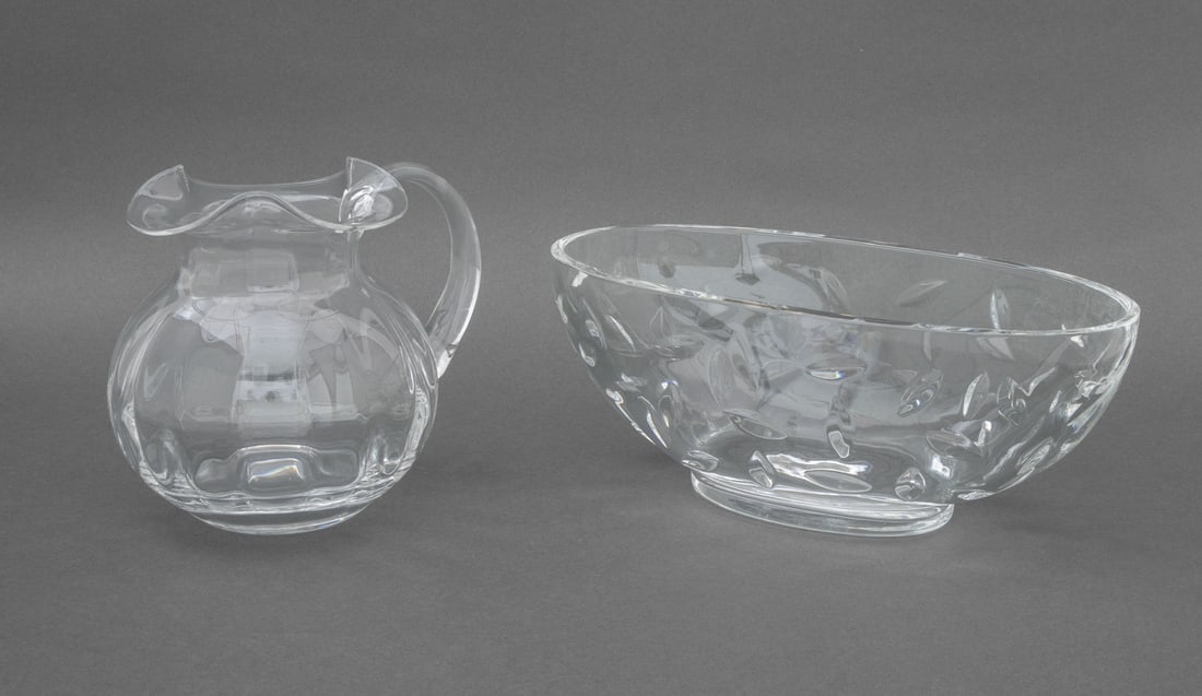 Tiffany & Co. Crystal Centerpiece Bowl & Pitcher: Tiffany and Company Oval Crystal Centerpiece Bowl and Ribbed Pitcher, marked to undersides. 5" H x 13" W x 6.75" D. Provenance: From an East Village Estate. Keywords: Designer, T&Co., Luxury brand, Ar