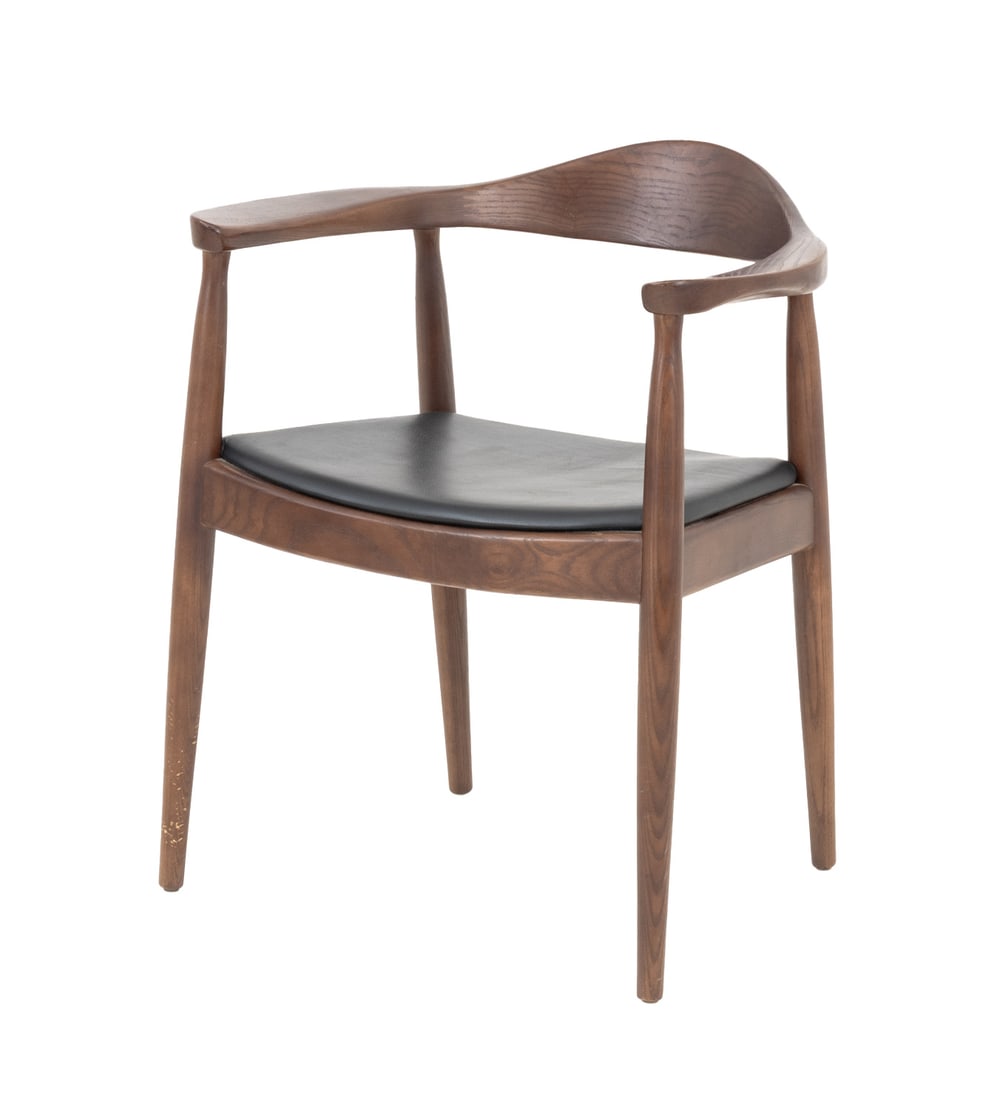 Hans J. Wegner Style Teak Armchair: Hans J. Wegner Style Teak Arm Chair, with black leather seat on four tapered legs. 29.5" H x 25.25" W x 17.5" D; seat: 18.5" H; arms: 28" H. Provenance: From an East Village Estate. Keywords: Modern F