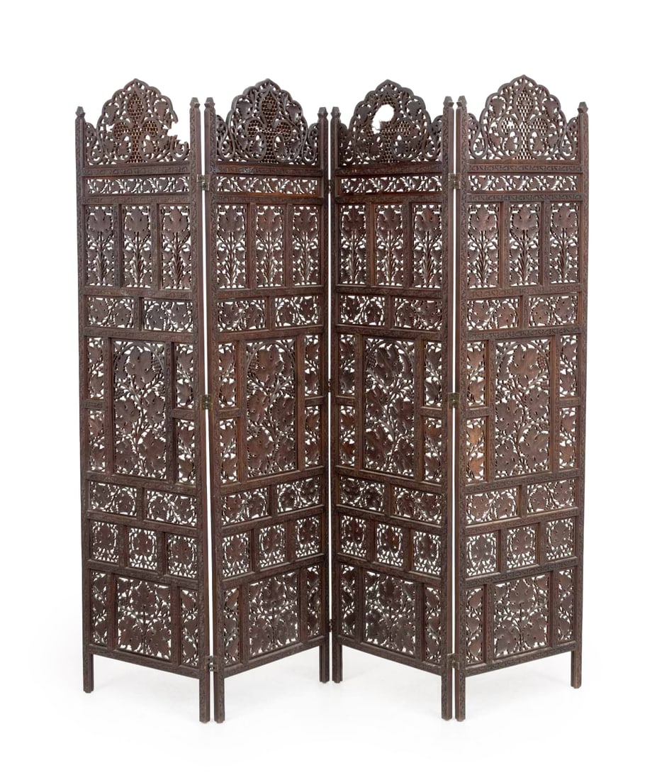 Anglo-Indian Carved Hardwood Four-Panel Screen: Anglo-Indian Pierced Carved Hardwood Four-Panel Folding Screen, with grapevine motif. Each panel: 73" H x 19.5" W x 1" D; overall: 79.25" W. Provenance: From a New York City Estate. Keywords: Vintage