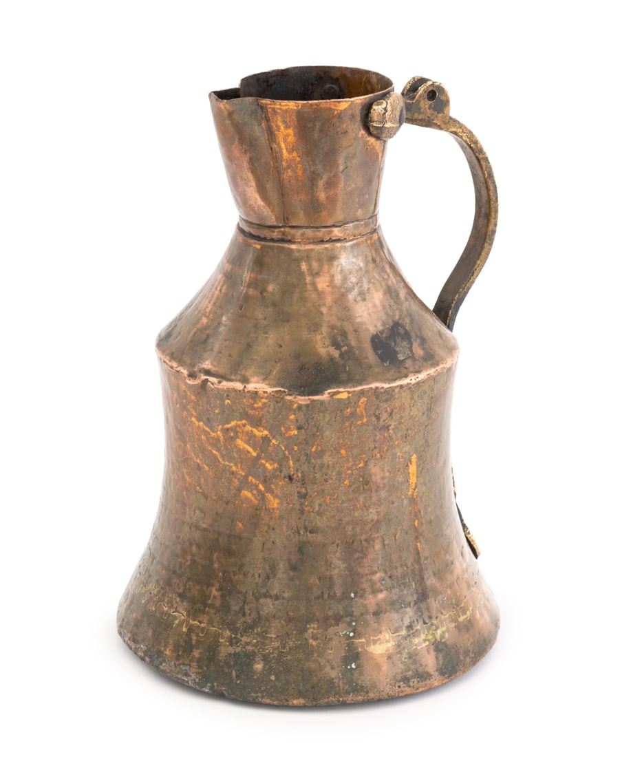Turkish Hand-Hammered Copper Pitcher, 19th C.: Turkish Hand-Hammered Copper Pitcher, 19th century, with brass handle. 10.75" H x 7.25" Diameter. Provenance: From an East 35th Street Estate. Keywords: Metalwork, Antiques, Jug, Vase, Vessel, Mixed m