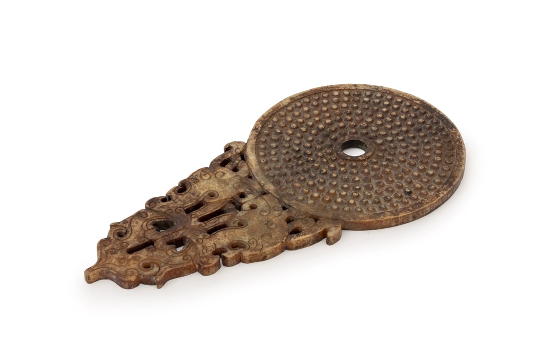 Chinese Archaistic Jade Bi Disc: Chinese Archaistic Jade Bi Disc. 11.25" L x 6" W x 0.25" D. Provenance: From a New York City Estate. Keywords: Asian Art, China, Carving, Statue, Sculpture, Carved stone, Greenstone, Hongshan style, D