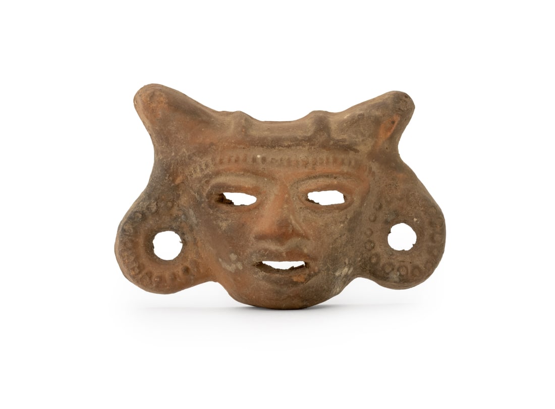 Mayan Terracotta Mask Sculpture: Mayan Terracotta Mask Sculpture. 3" H x 4" W x 1.5" D. Provenance: From a 480 Park Avenue Collection. Keywords: Mesoamerican Art, Pottery, Carving, Statue, Figurine, Pre-Columbian, Clay, Masque, Face,