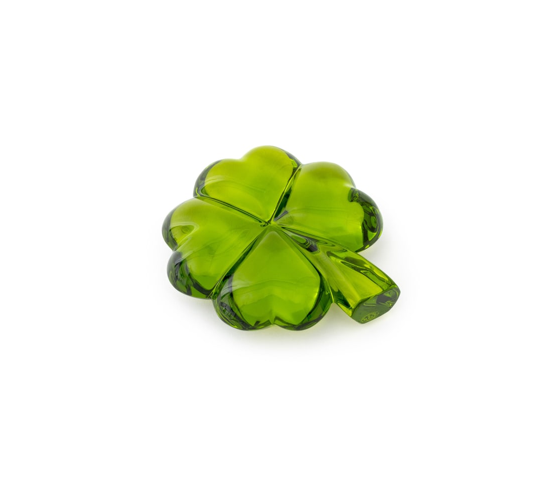 Baccarat Crystal Four Leaf Clover Paperweight: Baccarat Green Crystal Four Leaf Clover Paperweight, marked "Baccarat". 4.25" H x 3.75" W x 1.25" D. Provenance: From an East 74th Street Estate. Keywords: Studio glass, Designer, French glass, Docume