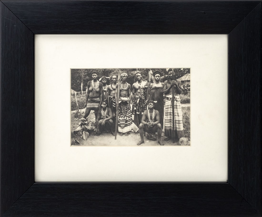Africans Holding Spears Offset Lithograph: African Tribe Members Holding Spears, Offset Lithograph, ebonized wood frame. Image: 4" H x 6.25" W; frame: 11.5" H x 13.75" W x 1" D. Provenance: From a New Jersey Collection. Keywords: Photography,