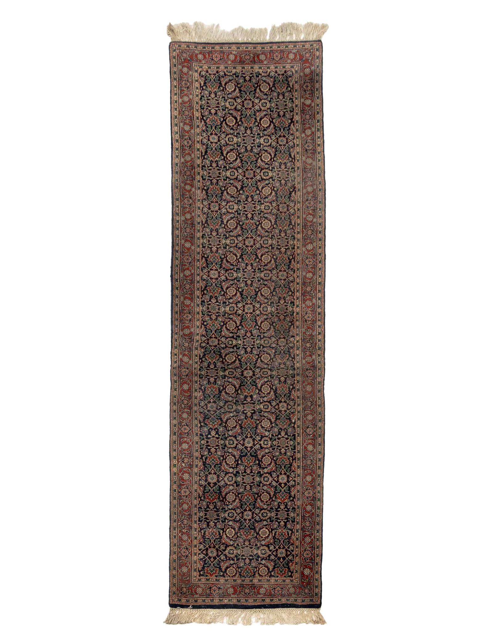 Indian Herati Design Runner, 10' 4" x 2' 8": Indian Herati Design Runner, with geometric floral pattern in red and navy blue, label to underside. 10' 4" L x 2' 8" W. Provenance: From a New York City Collection. Keywords: Rugs, Carpets, Wool, Tex