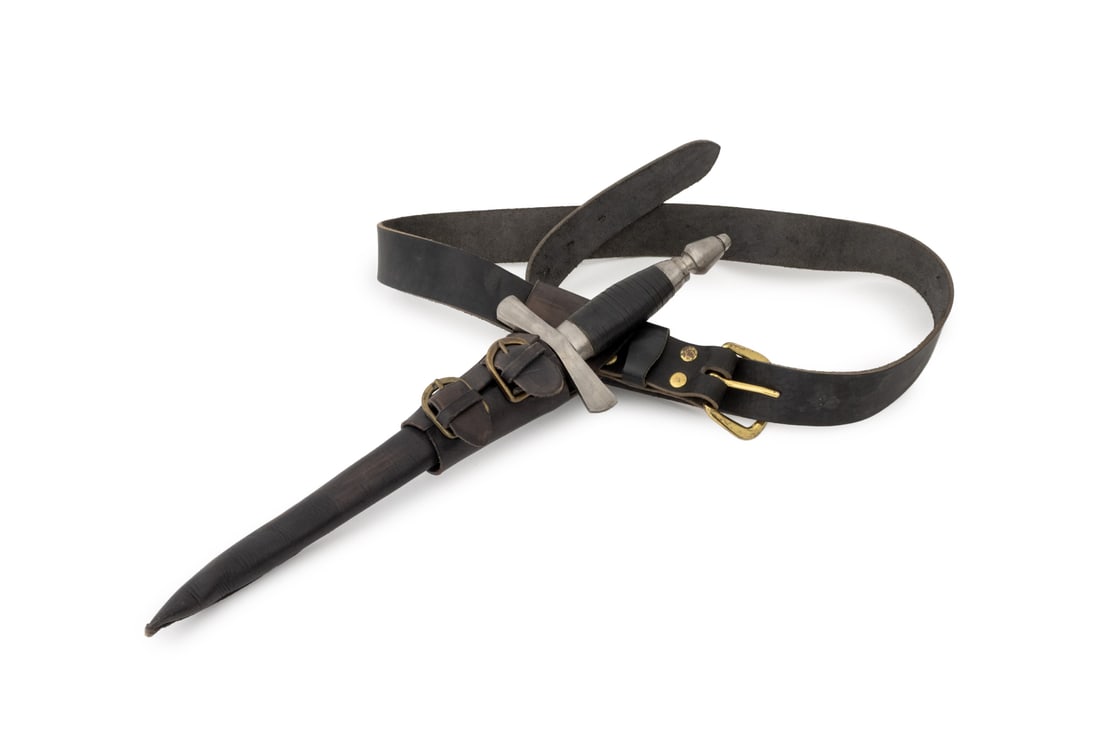 Medieval Style Dagger with Leather Belt Sheath: Medieval Style Dagger with Black Leather Belt Scabbard. Dagger: 16.25" H x 4.5" W x 1" D; belt: 52.5" L x 1.5" W; sheath: 15" H x 3.25" W x 2.25" D. Provenance: From a New York City Collection. Keywor