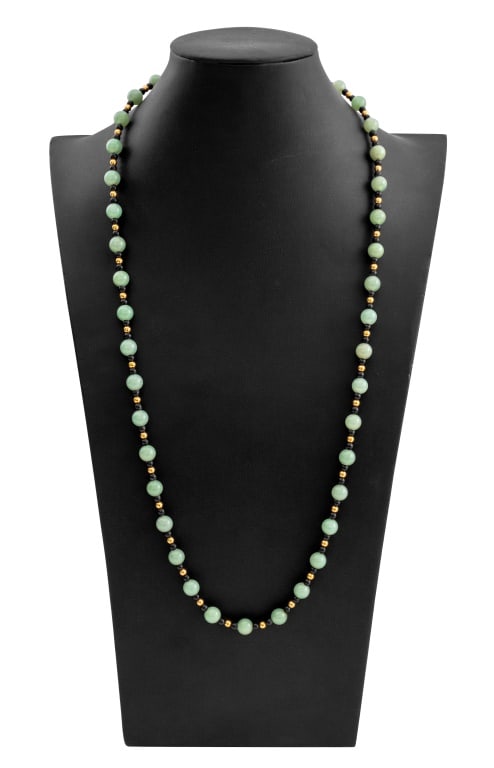 14K Yellow Gold Nephrite Black Onyx Bead Necklace: 14K Yellow Gold Light Green Nephrite and Black Onyx Bead Opera Length Necklace, 40 light green nephrite beads measuring approx. 8.75 mm and 84 black onyx beads measuring approx. 4.0 mm strung