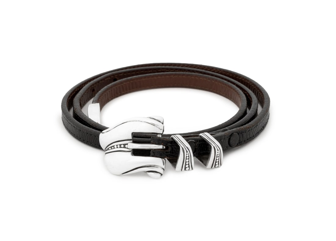 Barry Kieselstein-Cord Silver Buckle Leather Belt: Barry Kieselstein-Cord Sterling Silver Buckle Black Leather Belt, 1981, with sterling belt loops and end tip with black leather strap, marked and dated "B. Kieselstein Cord / Sterling Silver / 1981"