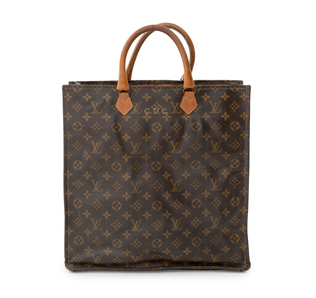Louis Vuitton Monogram Canvas Sac Plat Tote Bag: Louis Vuitton Monogram Canvas Sac Plat Tote Bag, with two tan leather top handles and monogrammed "CDC". 14.25" H x 14.75" W x 3" D. Provenance: From an East 74th Street Estate. Keywords: Handbag, Lug