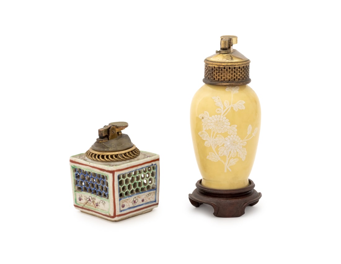 Japanese & Korean Porcelain Table Lighters, 2: Two Asian Porcelain Table Lighters, one reticulated Japanese porcelain lighter marked "Japan" to brass top and one Korean vasiform yellow ground table lighter marked "Korea" to top. Taller: 7" H x 3"