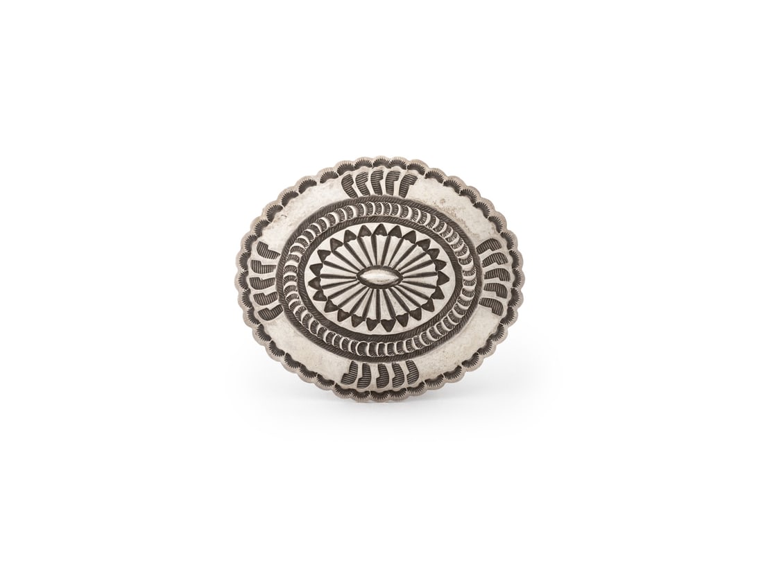 Pete Morgan Navajo Sterling Silver Belt Buckle: Pete Morgan Navajo Dine Sterling Silver Belt Buckle, designed with decorative tribal stamp work, worn with hinged belt loop and hook, will fit 1 3/4" belt, marked: "M Sterling". Measuring approx. 3 1/