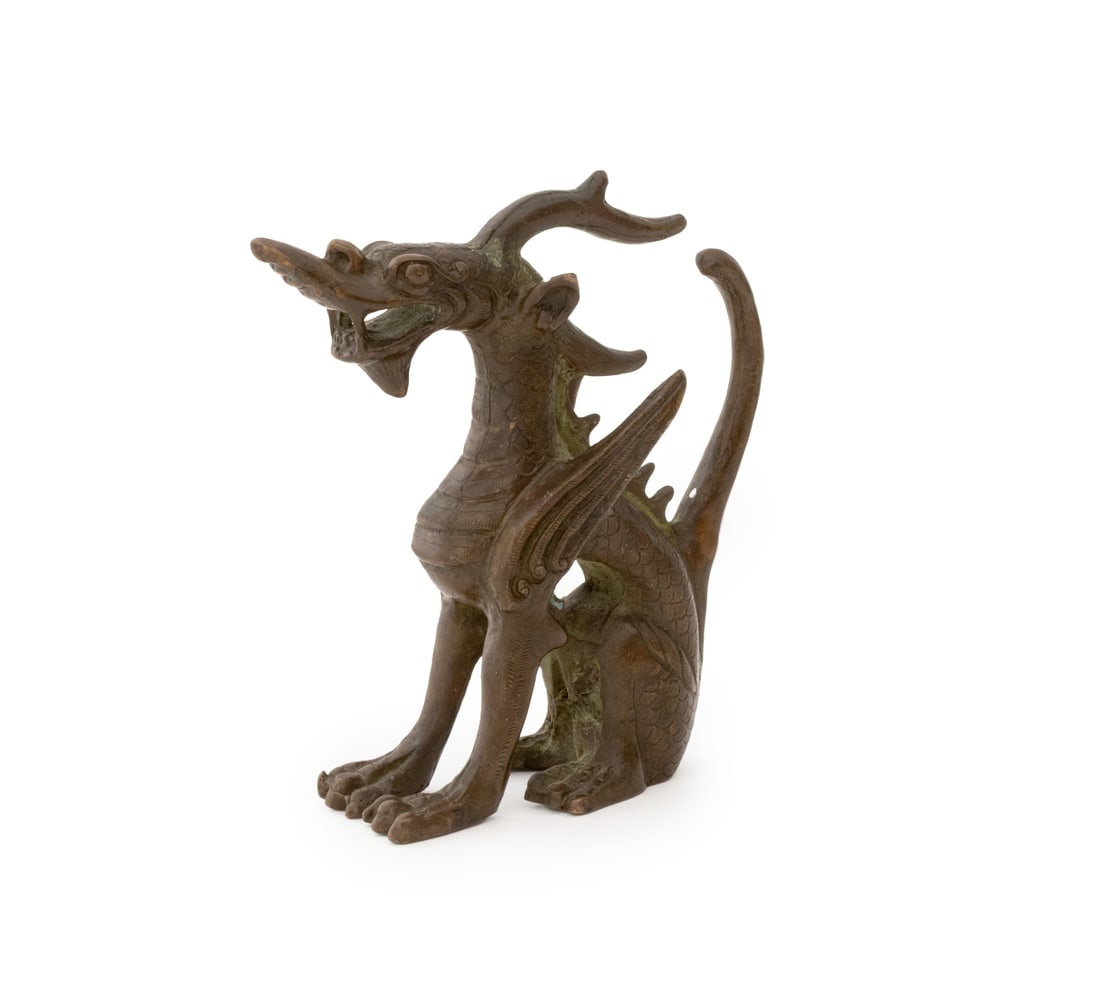 Chinese Seated Qilin Patinated Bronze Sculpture: Chinese Seated Qilin Patinated Bronze Sculpture. 4" H x 3.5" W x 1.5" D. Provenance: From an East Village Collection. Keywords: Mythical Beast, Statue, Asian Art, Figurine, Kirin, Dragon, Animalier, Q