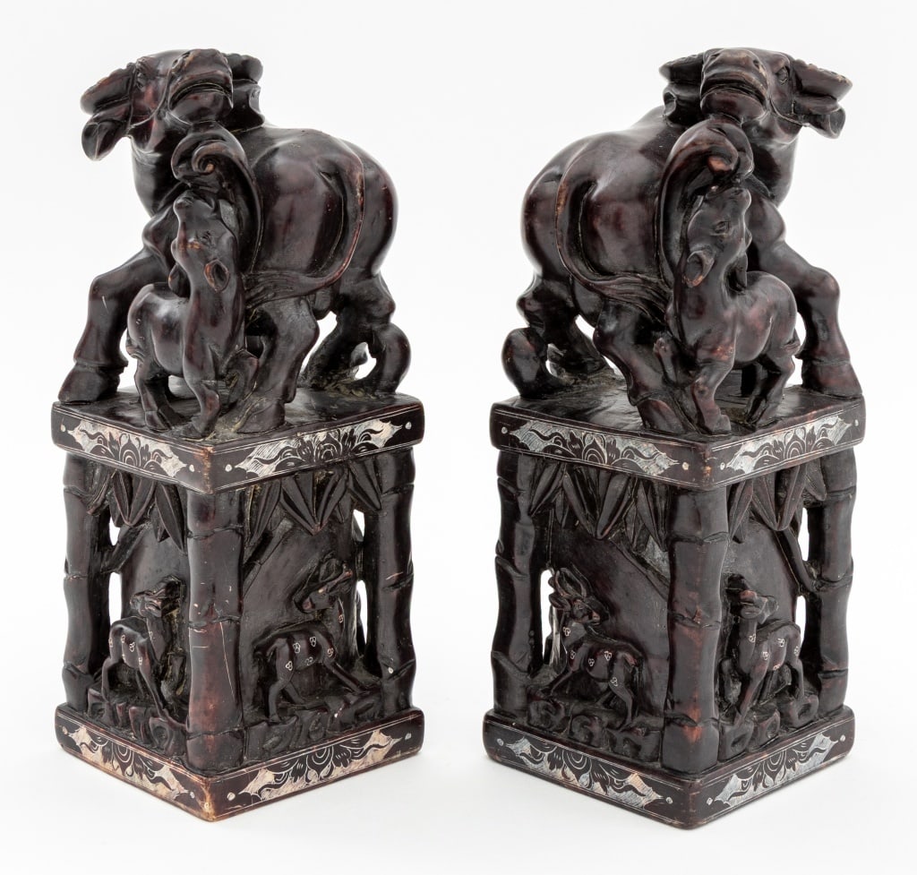Chinese Carved Stone Large Chop Seals, Pair: Pair of Chinese Carved Hardstone Large Chop Seals, the reticulated bases with stag vignette reliefs, the upper portions depicting an ox mother and child. 8.25" H x 3" W x 3" D. Provenance: From an Eas