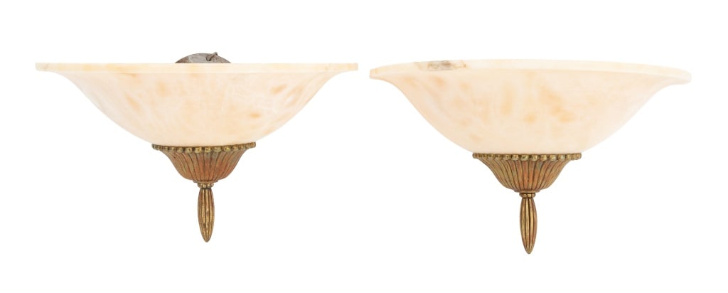 Art Deco Alabaster & Gilt Metal Wall Sconces, Pair: Pair of Art Deco Alabaster and Gilt Metal Wall Sconces, each with two light bulb fittings. 9" H x 14" W x 7.5" D. Provenance: From a New York City Collection. Keywords: Lighting, Fixtures, Wall mounte