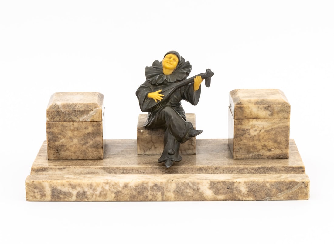 Ferdinand Bing & Co. Figural Marble Inkstand: Ferdinand Bing and Company Figural Marble Inkstand, with resin seated pierrot playing mandolin flanked by two covered inkwells with glass inserts and pen well, marked "FBS / Germany" to underside. 5.7